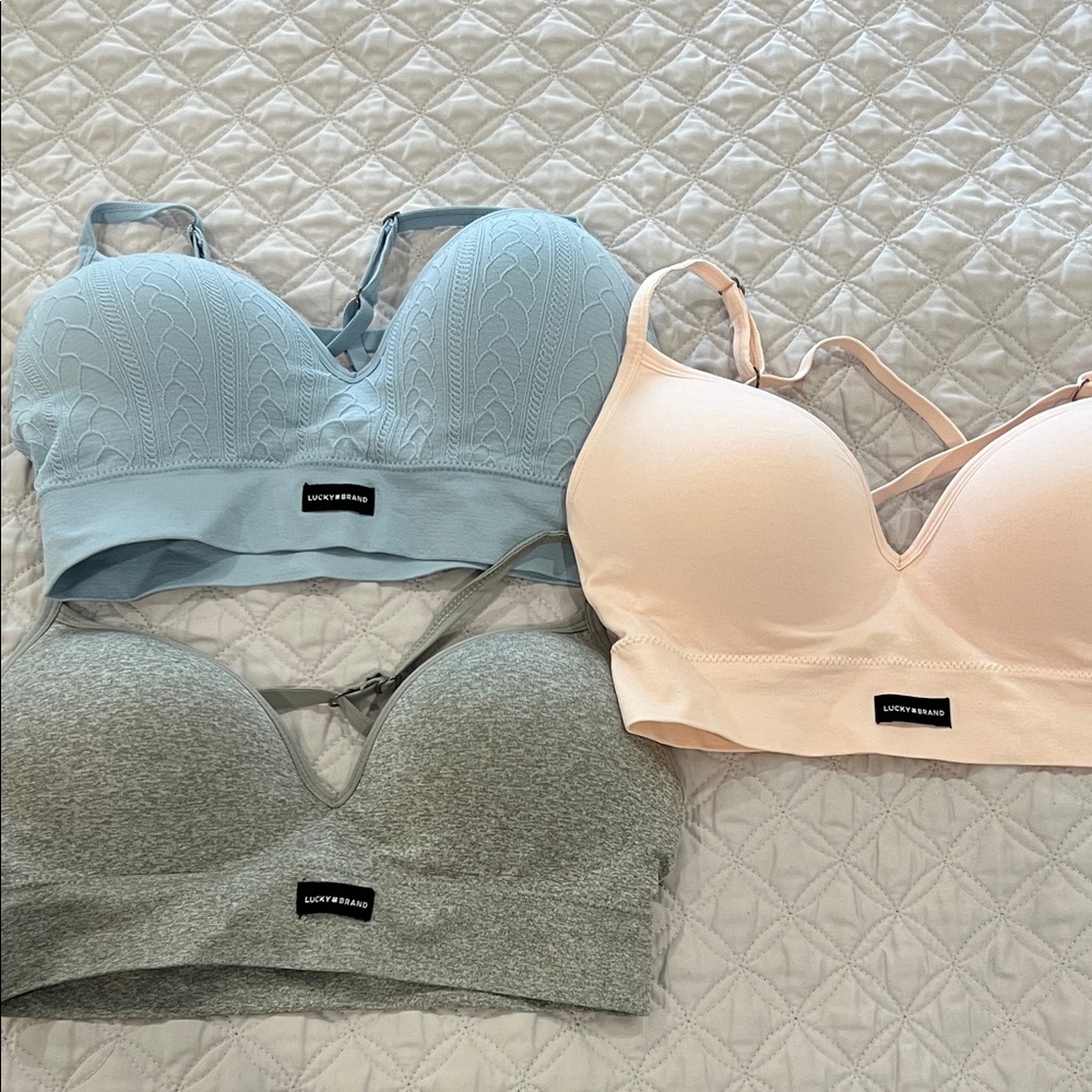 NEW. Never been worn Lucky Brand Women's Bra Trio - Blue, Pink, Gray all medium
